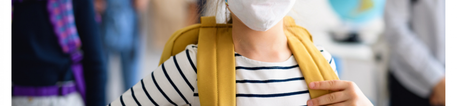 Child at school wearing mask