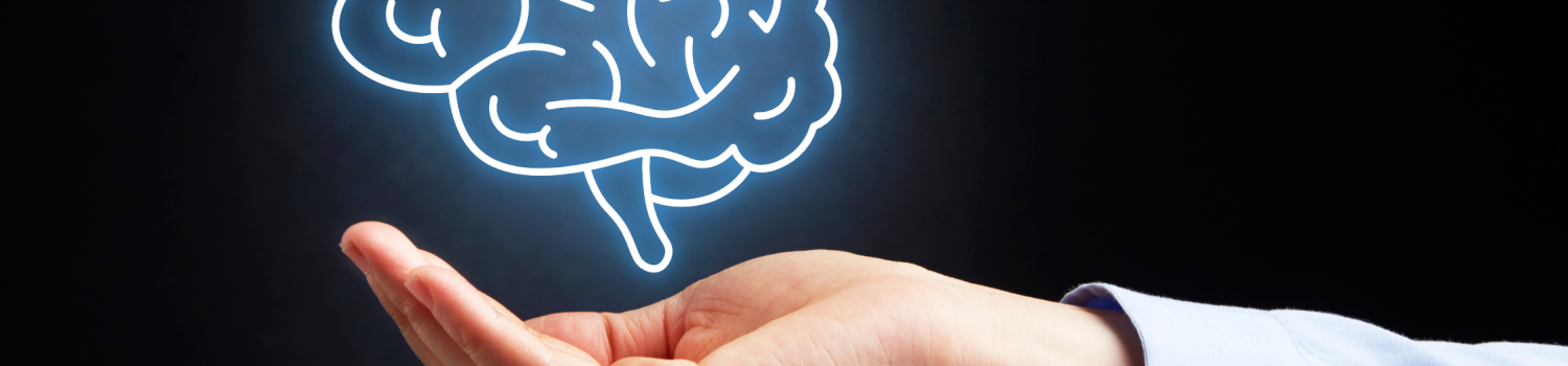 a glowing neon brain vector drawing hovering over a picture of an extended cupped hand with a dark background