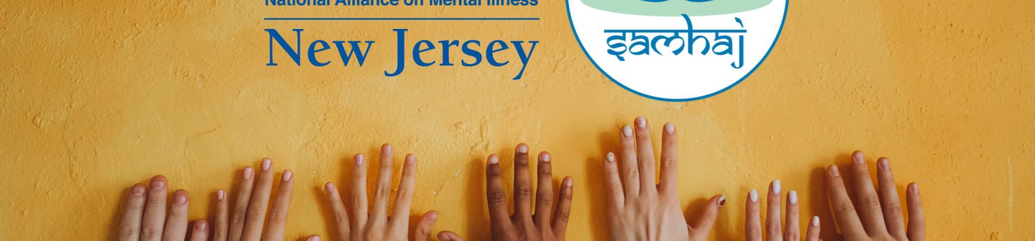 many hands of different shades of brown on a golden yellow painted stone wall with the NAMI NJ logo and SAMHAJ logo