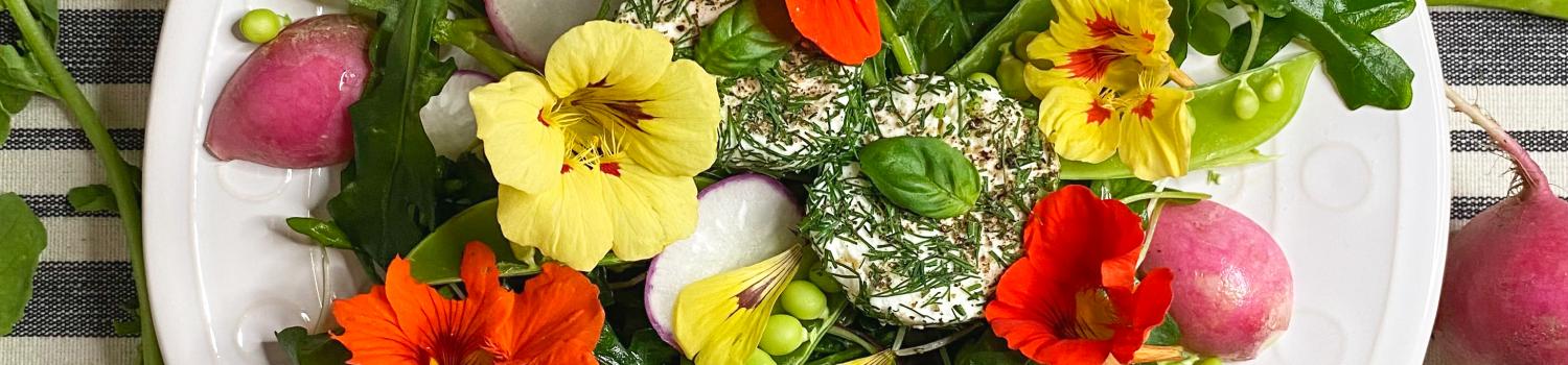 Photo of an edible flower salad with peas