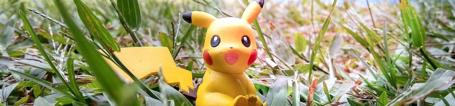 Pikachu toy in grass