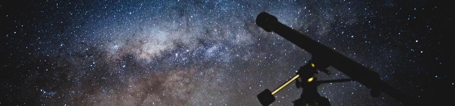 Night sky with telescope