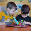 Children creating with 3D-printing pen
